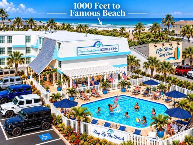 NEW 2026-Ocean Sands Beach Boutique Inn-24Hr Sauna and Salt-Mineral Pool-Free Beach Bikes and Famous Beach-Fresh Baked Cookies-Popcorn-In Room Bathrobes-Sunscreen-65 Inch TVsNetflix-Bedside Candy-Free Laundry- 4 Grand Black Beds-Call & Save-1-252-AHA-SAND — 1.4 km away from Wright Brothers Memorial Outer Banks